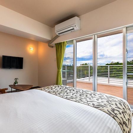 มิสเตอร์คินโจะ อินฟรอนต์ออฟ มันซะบีช Aparthotel อนนะ ภายนอก รูปภาพ
